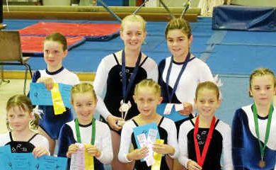 Level 2 gymnastics ribbon and medal winners (back, from left) Sharani Baker, Olivia Noble, Serena Wyllie, (front) Rosemary McDonald, Nikki Burraston, Emily Riley, Brittany Bailey and Emily Skelton after success for Warwick. Level 2 gymnastics ribbon and medal winners (back, from left) Sharani Baker, Olivia Noble, Serena Wyllie, (front) Rosemary McDonald, Nikki Burraston, Emily Riley, Brittany Bailey and Emily Skelton after success for Warwick.